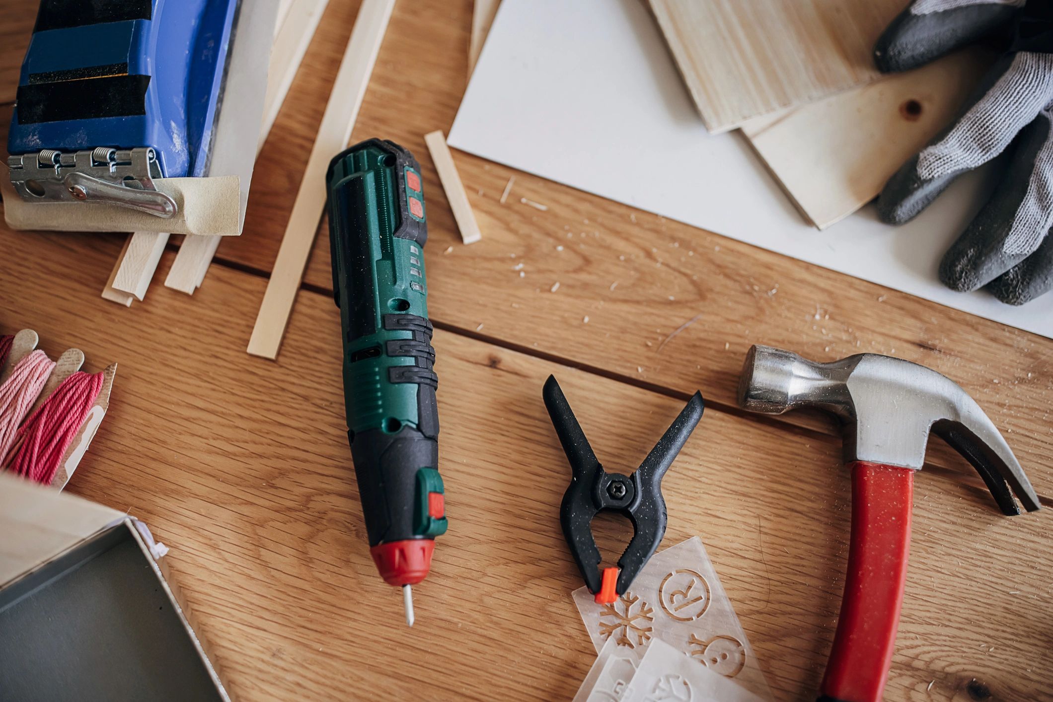 Tools on a workbench representing professional repair work