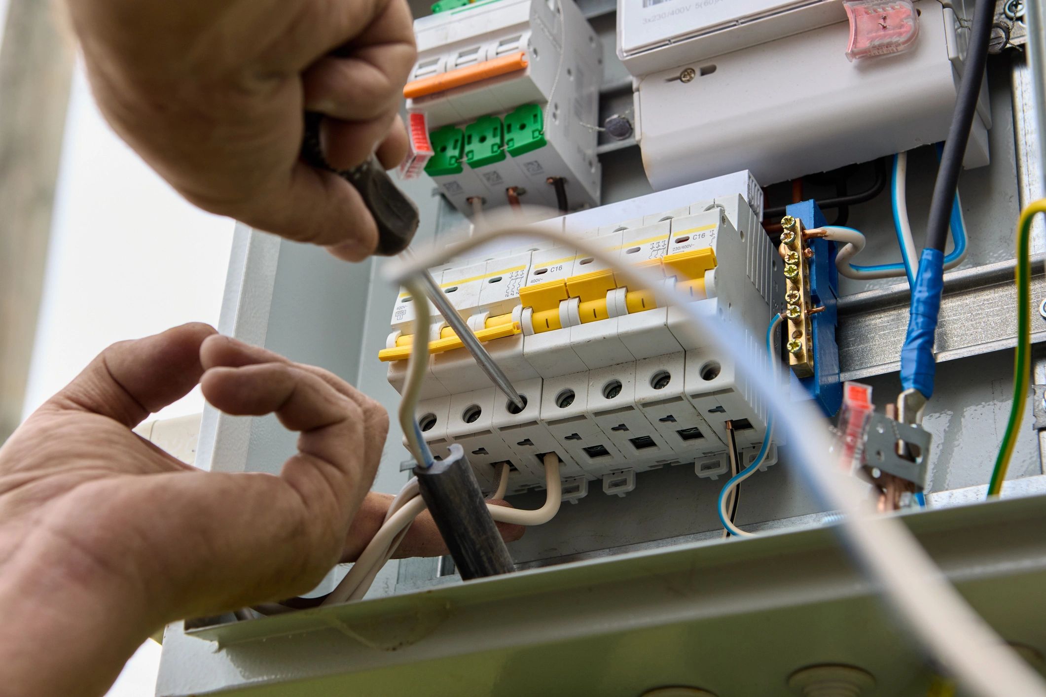 Close-up of an electrical panel with breakers